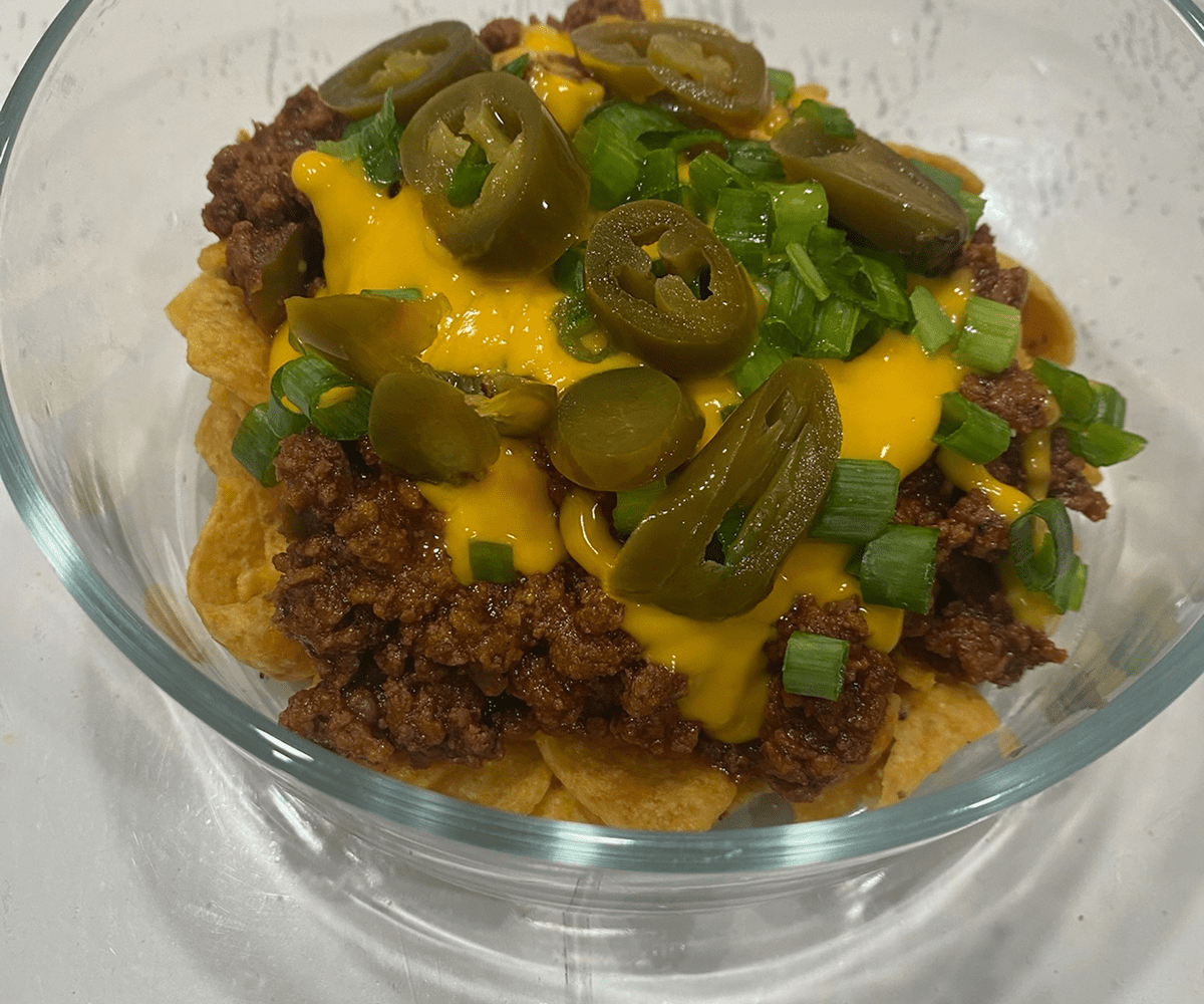 Nachos with beef and green onions